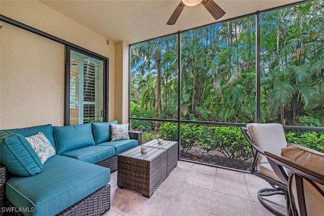 sunroom with ceiling fan