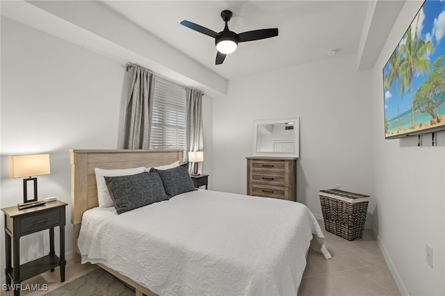 bedroom featuring light tile patterned floors and ceiling fan