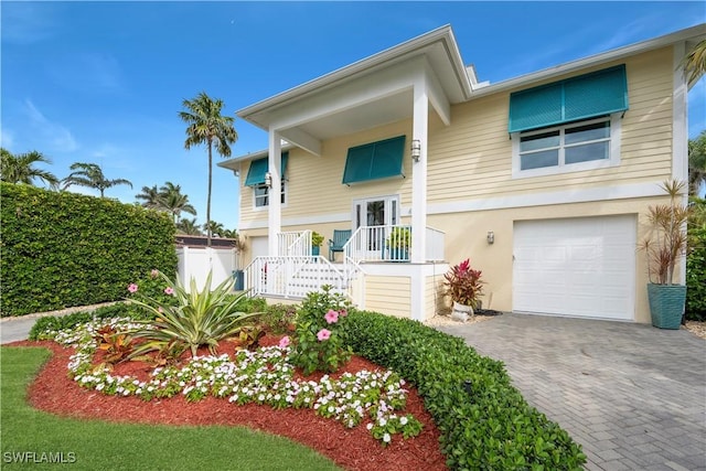 view of front of property featuring a garage