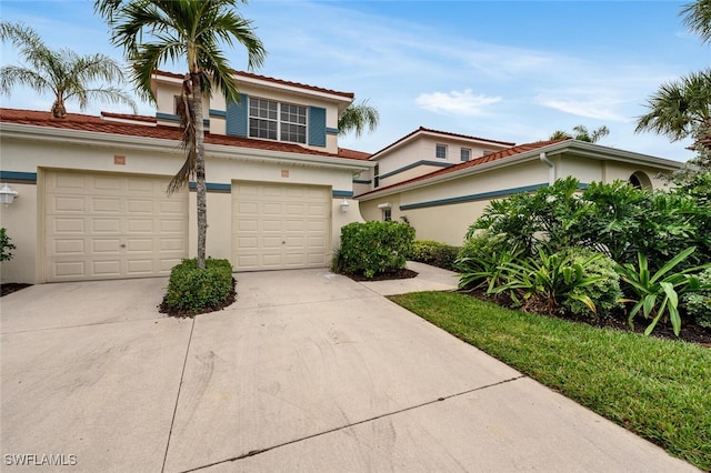 mediterranean / spanish-style house featuring a garage