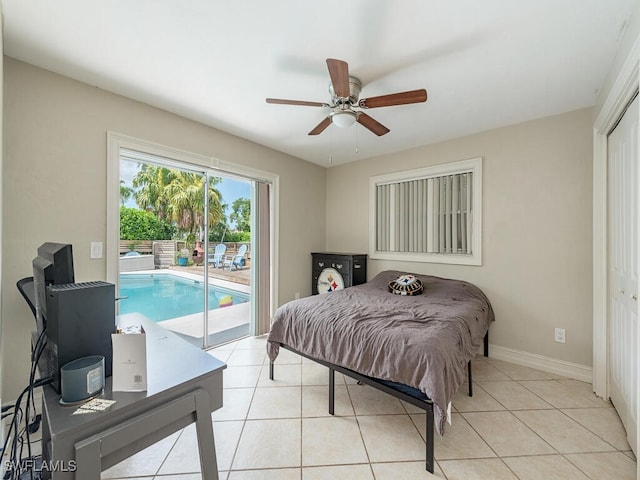 bedroom featuring access to outside, ceiling fan, and light tile patterned flooring