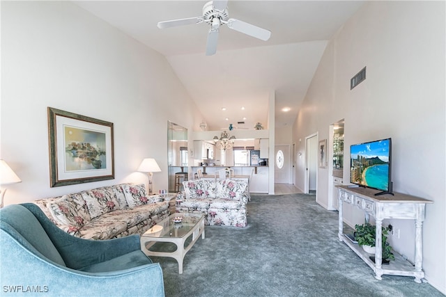 living room featuring ceiling fan, high vaulted ceiling, and dark colored carpet