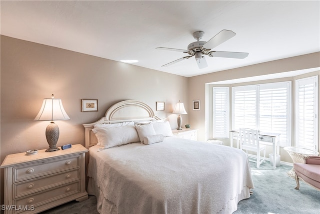 bedroom featuring ceiling fan and carpet flooring