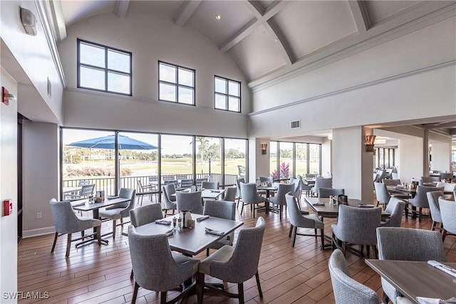 dining room with a high ceiling