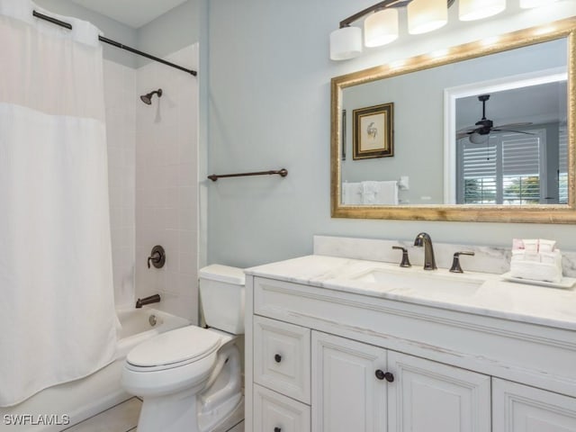 full bathroom featuring ceiling fan, toilet, vanity, and shower / bath combo