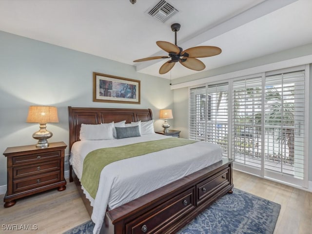 bedroom with ceiling fan, access to exterior, and light hardwood / wood-style floors