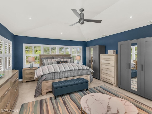 bedroom with light tile patterned floors, ceiling fan, access to exterior, and lofted ceiling