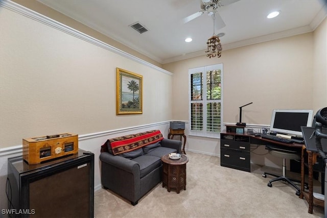 home office with ceiling fan, light colored carpet, and crown molding