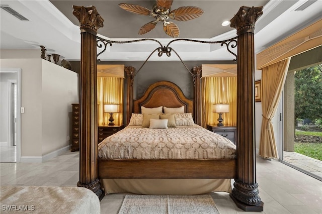 bedroom featuring ceiling fan, access to exterior, a raised ceiling, and crown molding