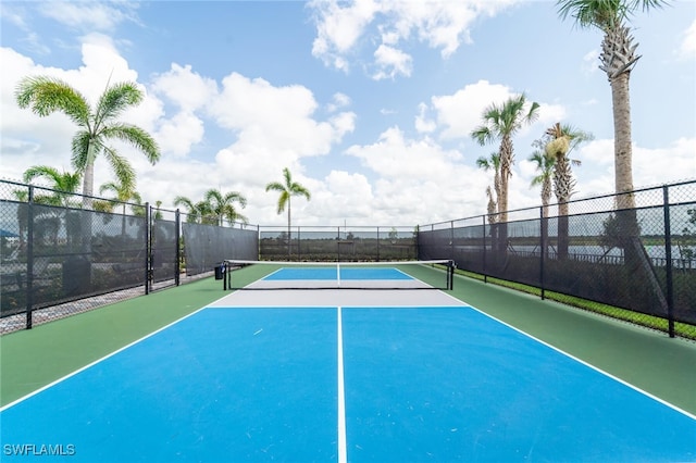 view of tennis court with basketball court