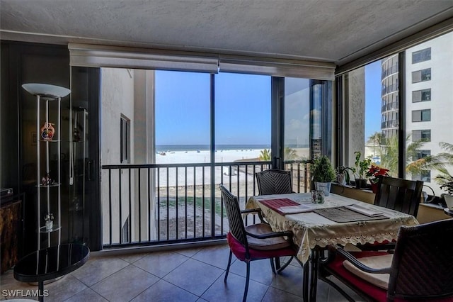 sunroom with a water view