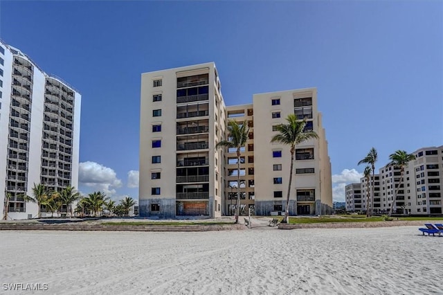 view of building exterior with a water view