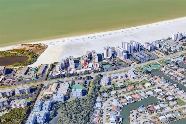 aerial view with a beach view and a water view