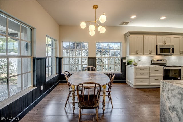 dining room with a notable chandelier