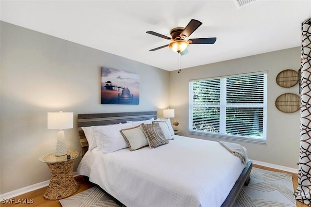 bedroom featuring ceiling fan and light wood-type flooring