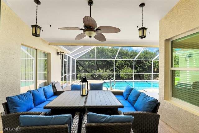 view of patio with an outdoor living space and glass enclosure