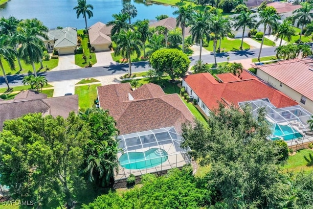 bird's eye view with a water view