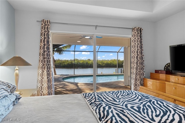 bedroom featuring access to exterior and a sunroom