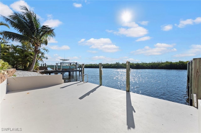 view of dock featuring a water view and boat lift