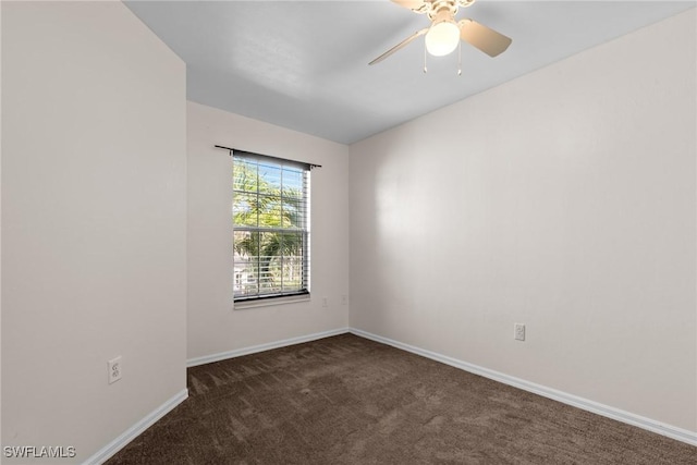 carpeted empty room with ceiling fan