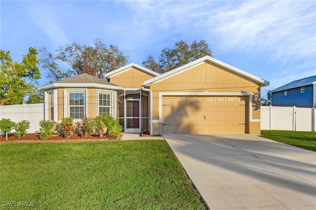 ranch-style home featuring a garage and a front yard