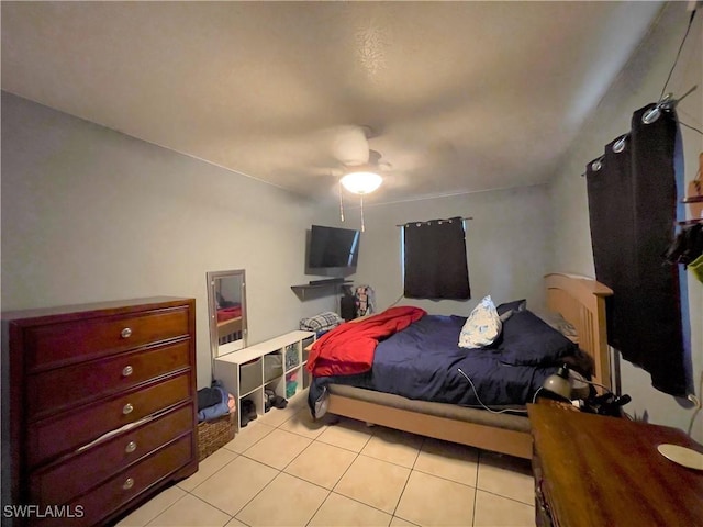 bedroom featuring ceiling fan and light tile patterned floors