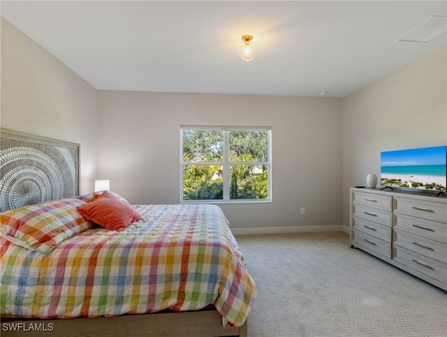 bedroom with light carpet