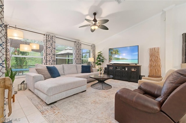 tiled living room featuring vaulted ceiling, crown molding, and ceiling fan