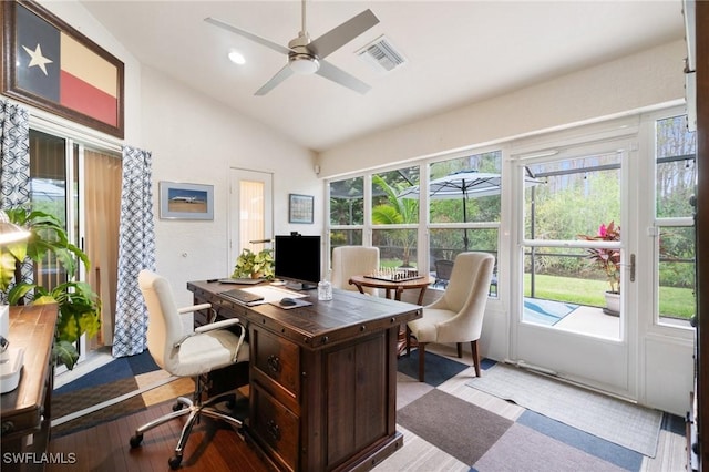 office area featuring light hardwood / wood-style flooring, vaulted ceiling, and ceiling fan