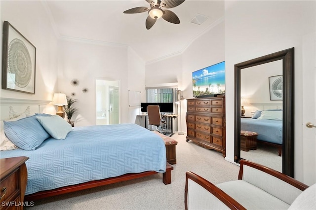 bedroom featuring ceiling fan, ornamental molding, carpet flooring, and ensuite bath