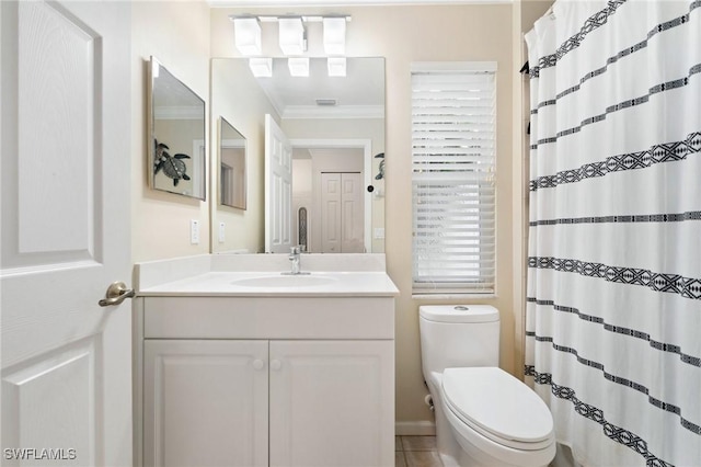 bathroom featuring ornamental molding, toilet, tile patterned flooring, and vanity