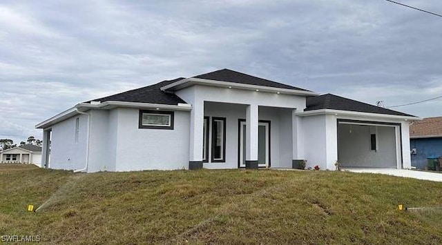 prairie-style home with a front lawn