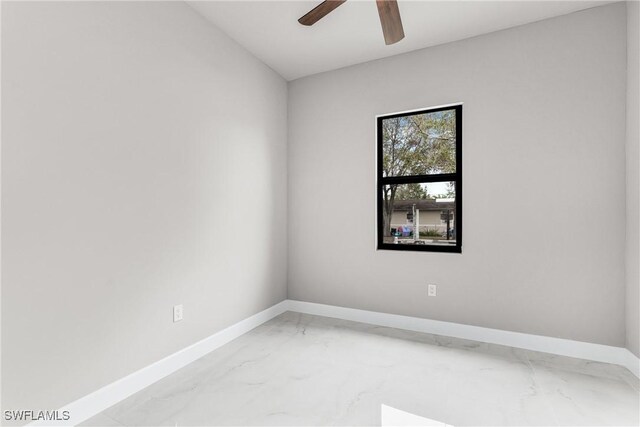 unfurnished room featuring ceiling fan