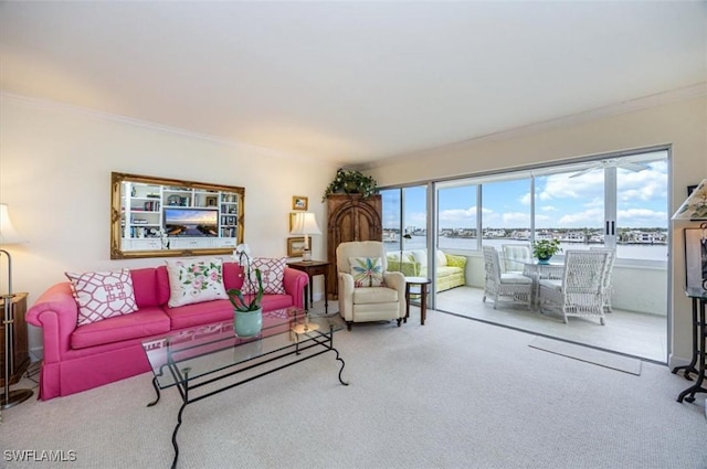 living room with carpet and ornamental molding