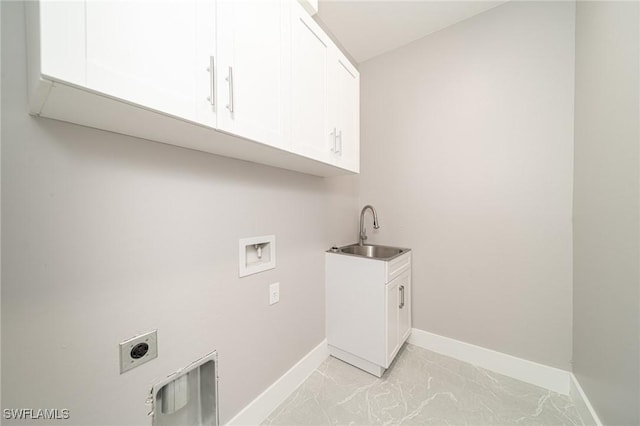 laundry area featuring cabinets, hookup for a washing machine, sink, and hookup for an electric dryer