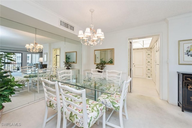 carpeted dining room with crown molding and a chandelier