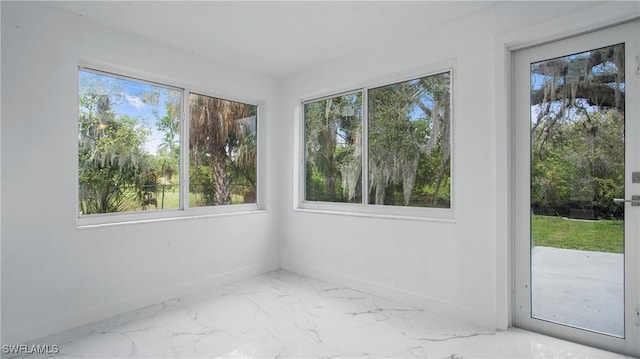 view of unfurnished sunroom