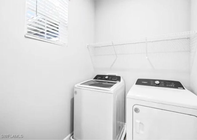 laundry room featuring independent washer and dryer