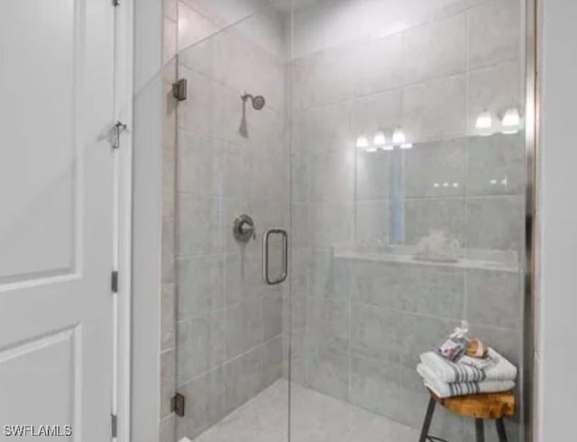 bathroom with an enclosed shower