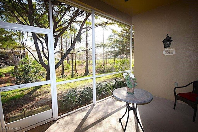 sunroom featuring a wealth of natural light