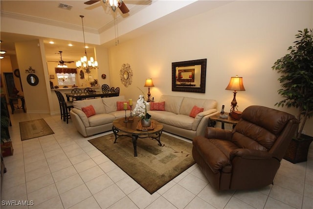 tiled living room featuring a raised ceiling, crown molding, and ceiling fan with notable chandelier