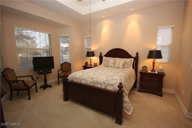 bedroom with light colored carpet