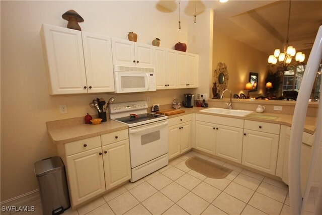 kitchen featuring sink, white cabinetry, decorative light fixtures, light tile patterned floors, and white appliances