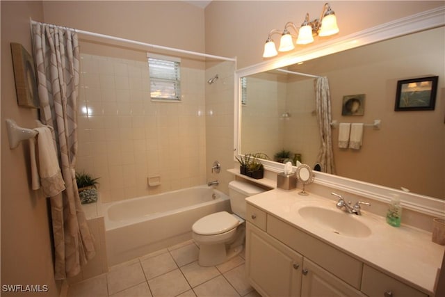 full bathroom with tile patterned flooring, toilet, vanity, and shower / bath combo with shower curtain