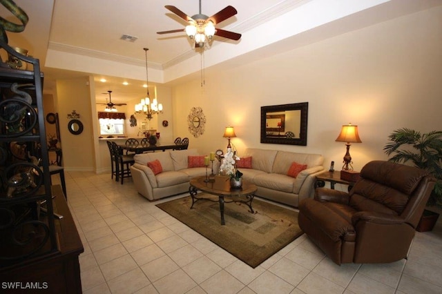 living room with a raised ceiling, ornamental molding, light tile patterned flooring, and ceiling fan