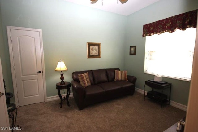 living room with carpet floors and ceiling fan