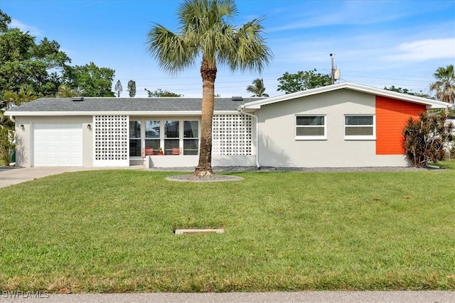 ranch-style house with a front yard and a garage