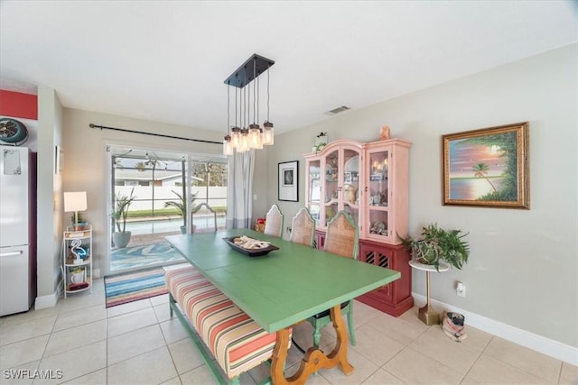 view of tiled dining space