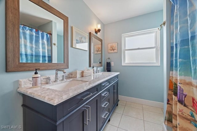 bathroom featuring tile patterned floors and vanity