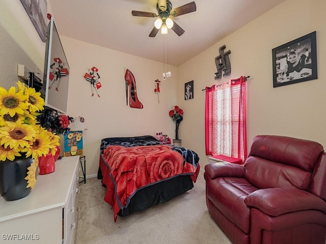 bedroom with light carpet and ceiling fan